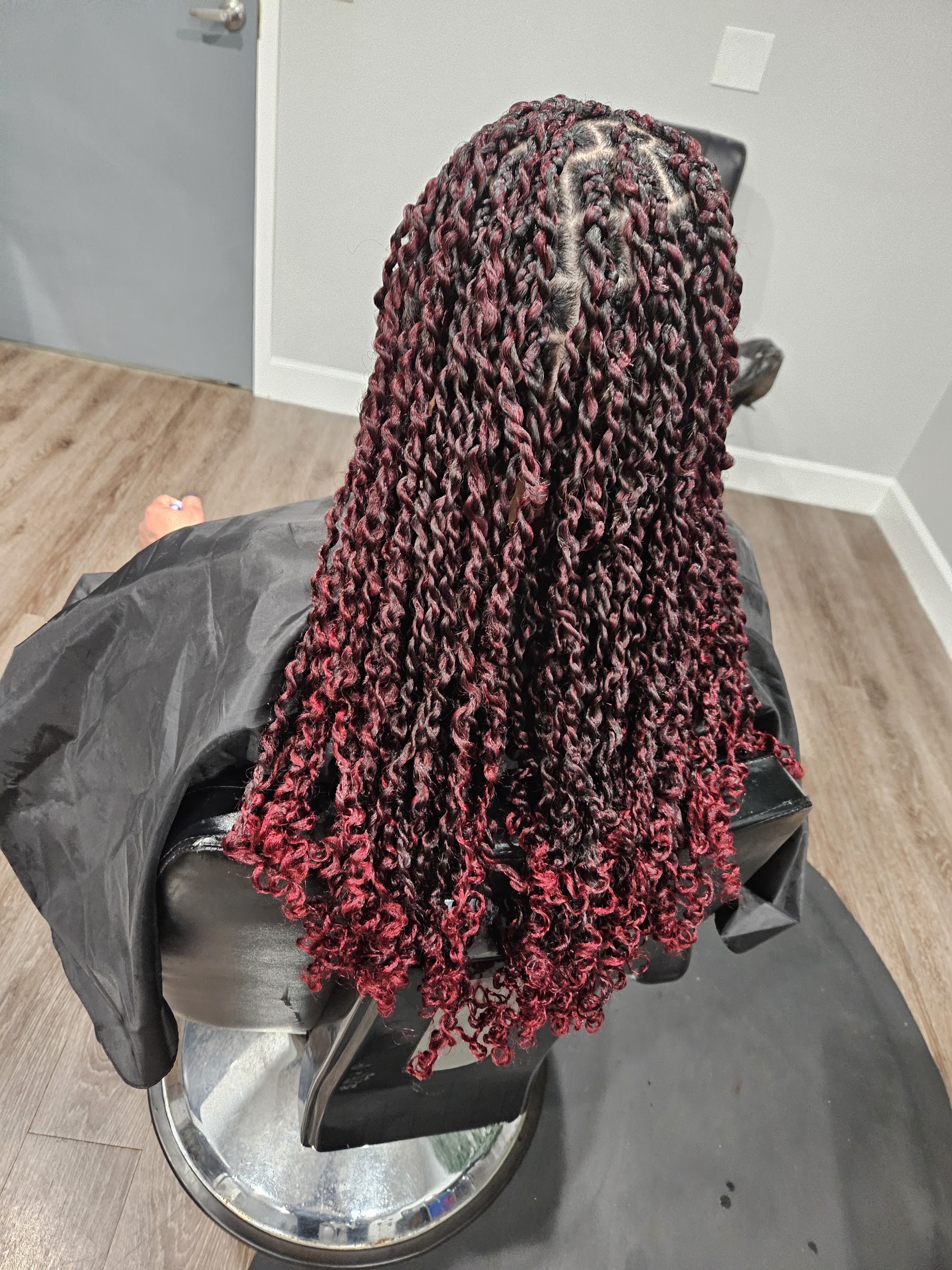 Red and black boho braids with curly ends